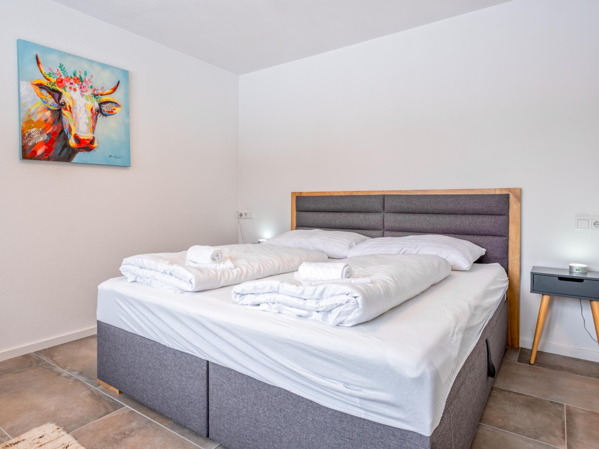 14211